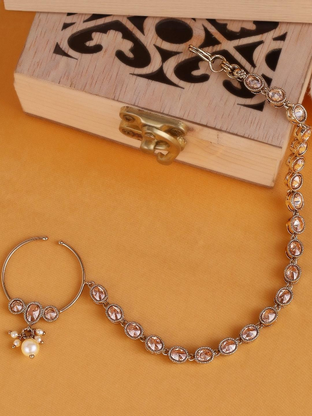 SALONI FASHION JEWELLERY Traditional Round Shape Crystal Gold Plated Nose Ring With Chain