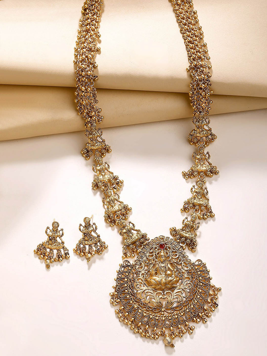 KARATCART Gold-Plated Artificial Stones Laxmi Mata Rani Temple Jewellery Set