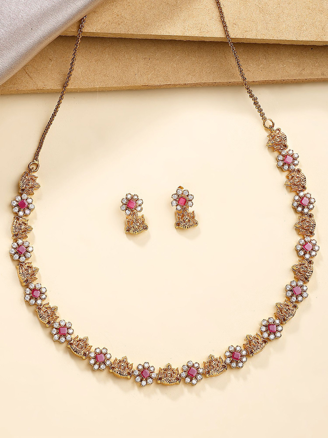 KARATCART Gold-Plated American Diamond Studded Laxmi Mata Jewellery Set