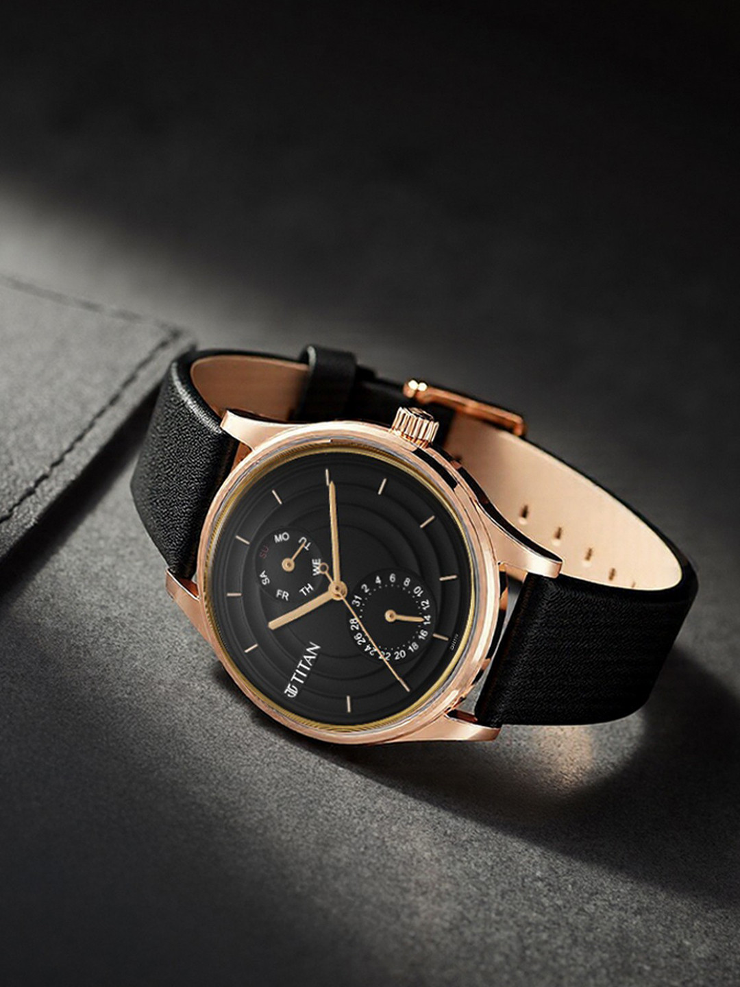 Titan Women Black Brass Dial Gold Toned Analogue Watch With Black Leather Straps