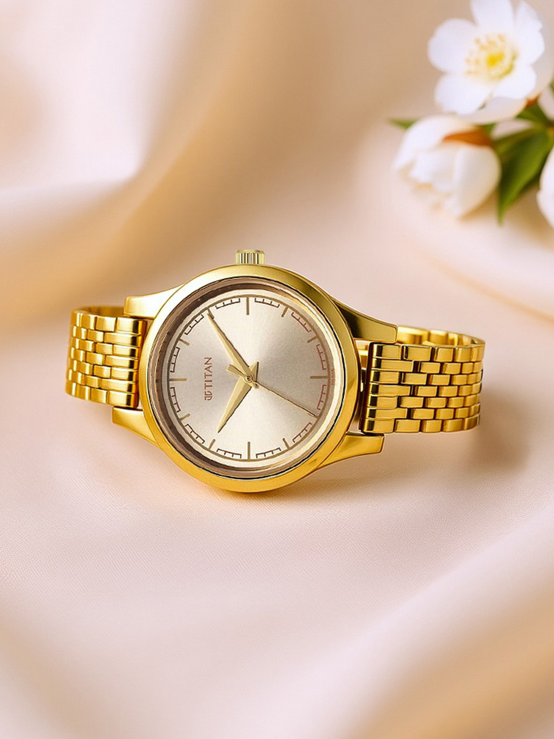 Titan Women Brass Dial & Stainless Steel Bracelet Style Straps Analogue Watch 2679YM02
