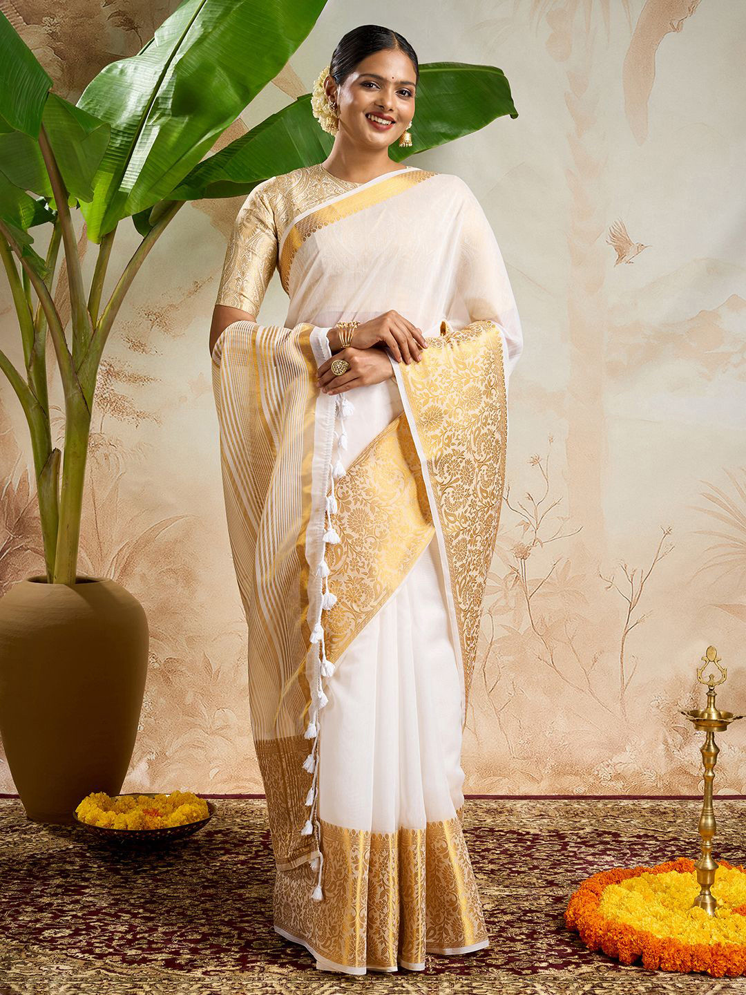 TEEJH Theeram Floral Woven Design Zari Cotton Silk Kasavu Saree
