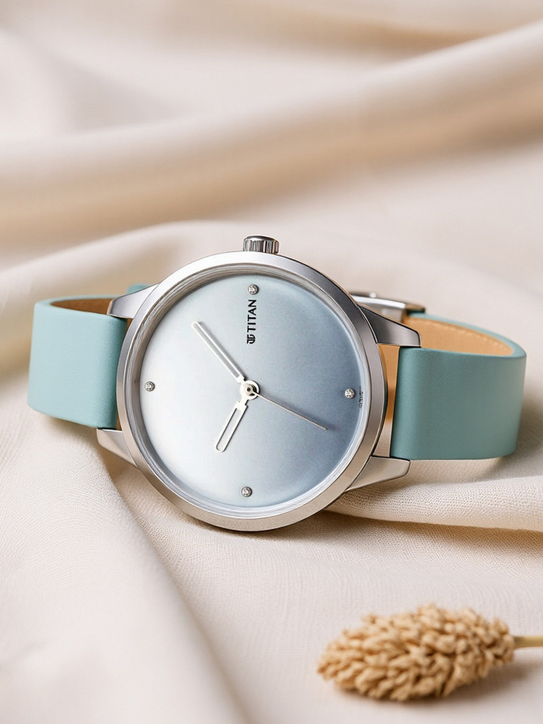 Titan Women Blue Brass Dial & Blue Leather Straps Analogue Watch 2664SL02