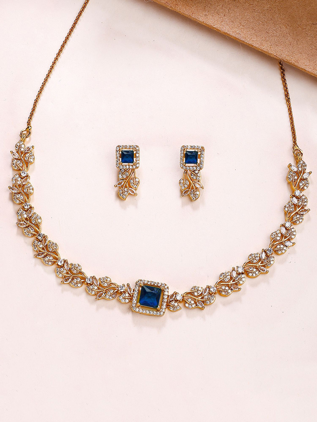 KARATCART Gold-Plated Floral Vine Blue American Diamond Necklace & Earrings Jewellery Set