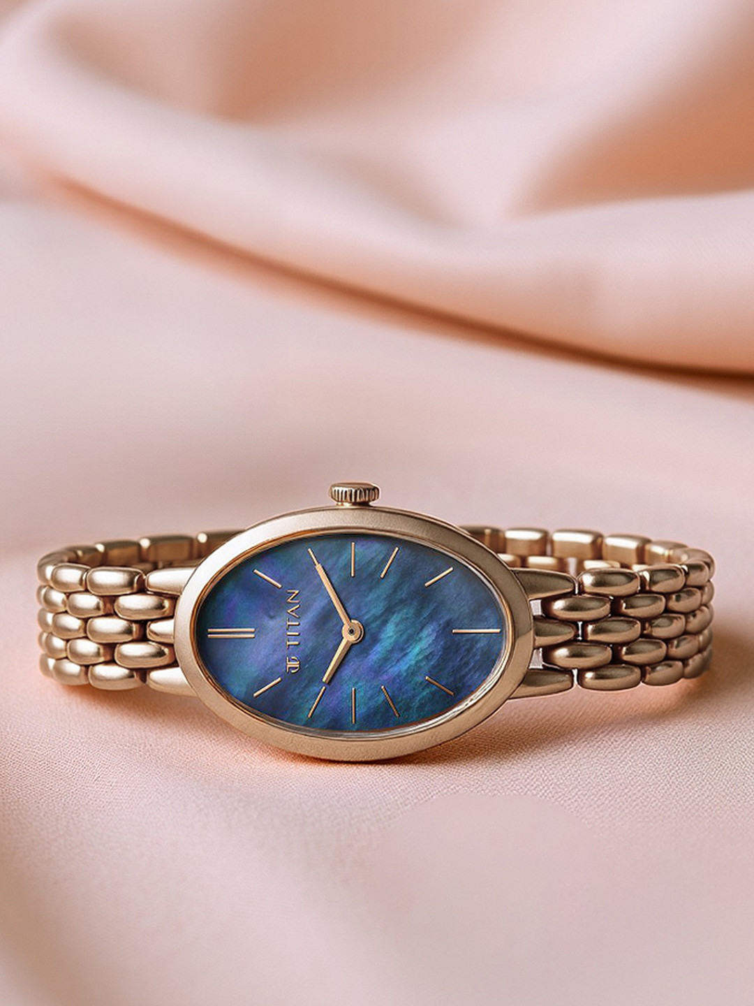 Titan Women Purple Mother of Pearl Bracelet Style Analogue Watch 95246WM01-Blue