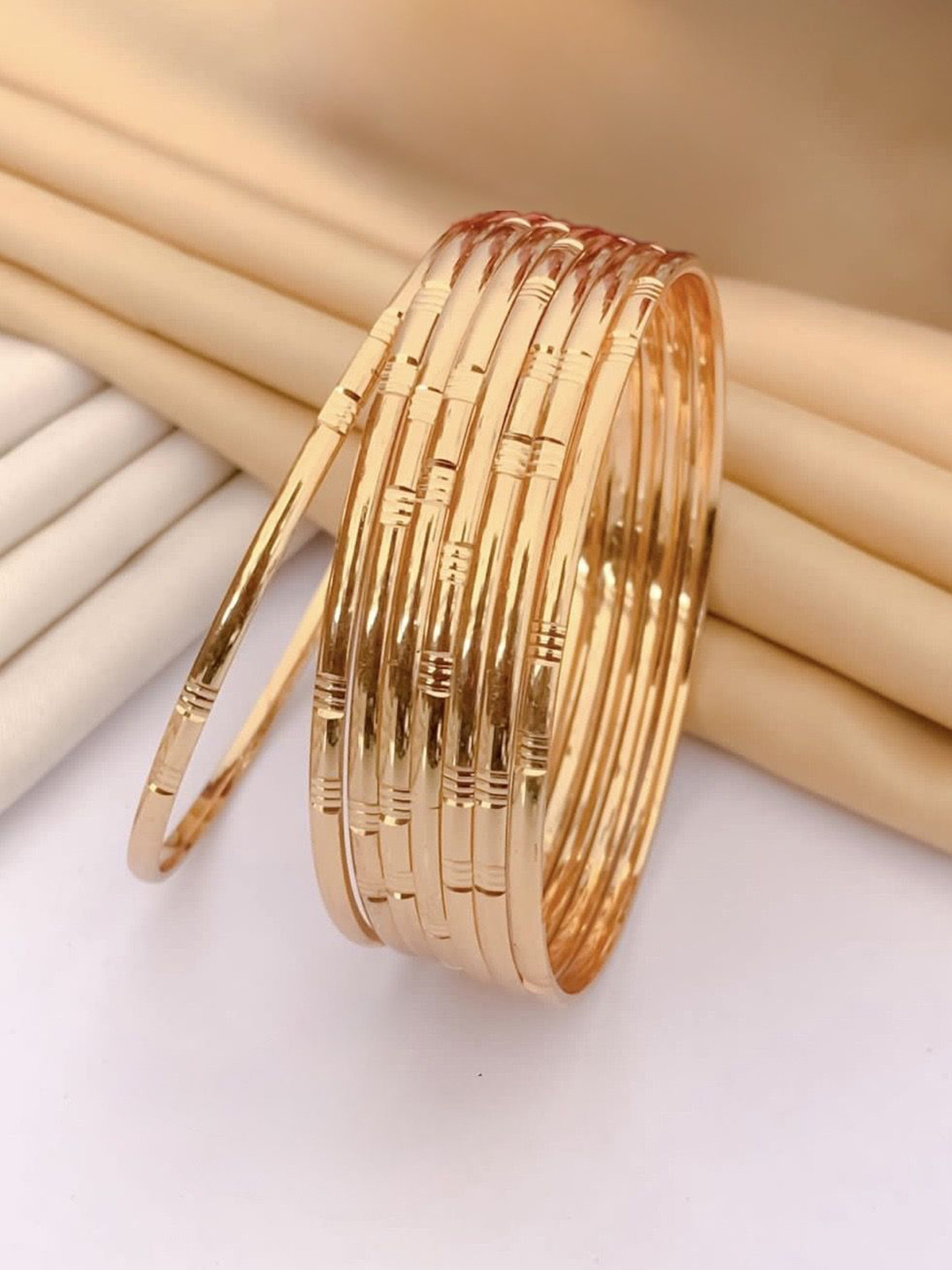 ATIBELLE Set Of 8 Gold-Plated Textured Bangles