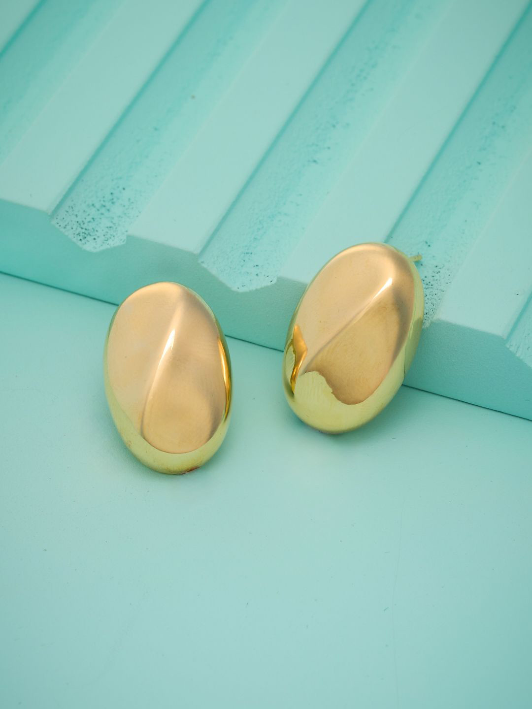 Kushal's Fashion Jewellery Gold-Plated Oval Shaped Studs Earrings