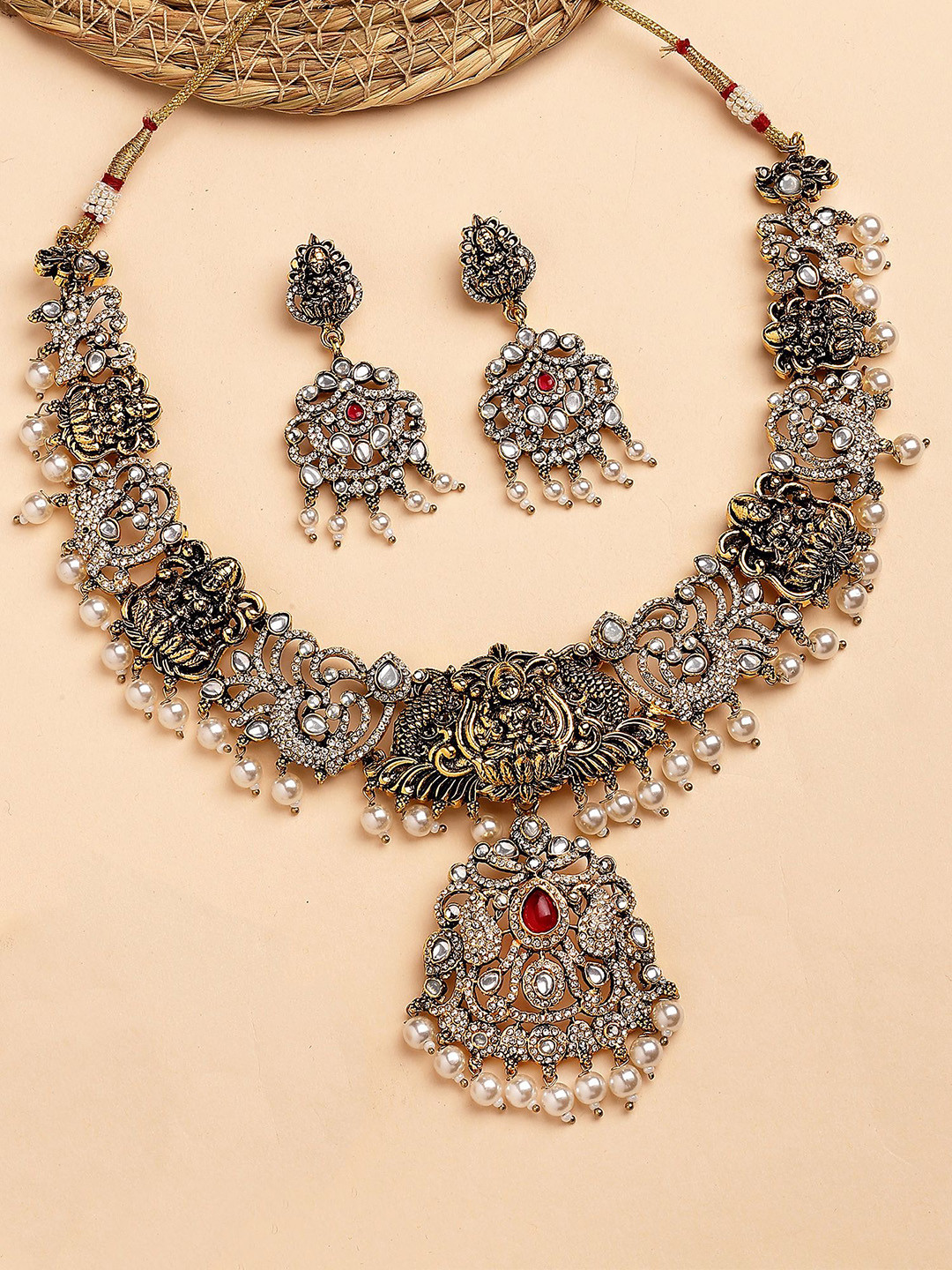 KARATCART Women Black Gold Plated Red Stone Laxmi Mata Temple Jewellery Set
