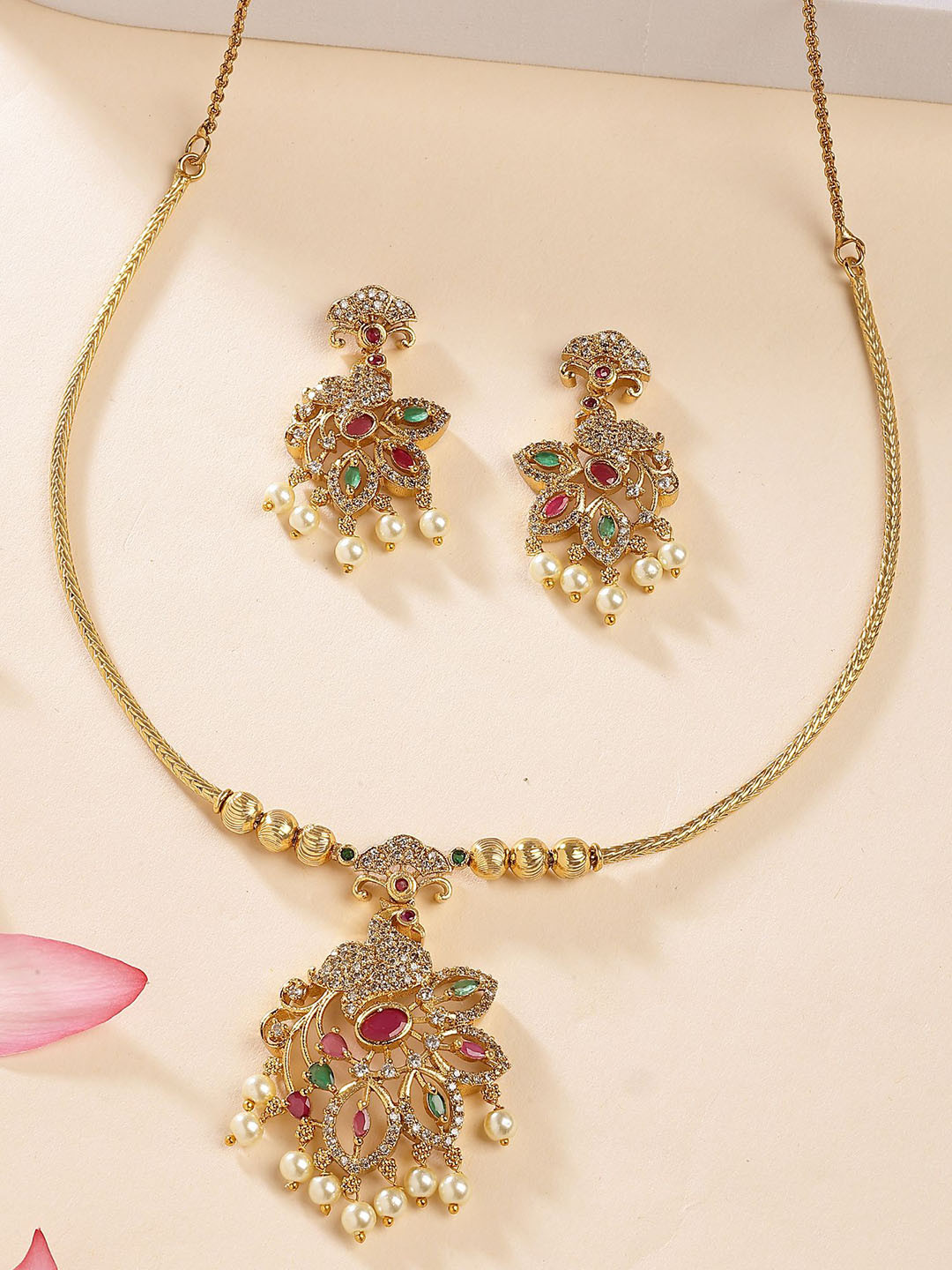 KARATCART Gold-Plated Peacock-Shaped Temple Necklace With Earring Set