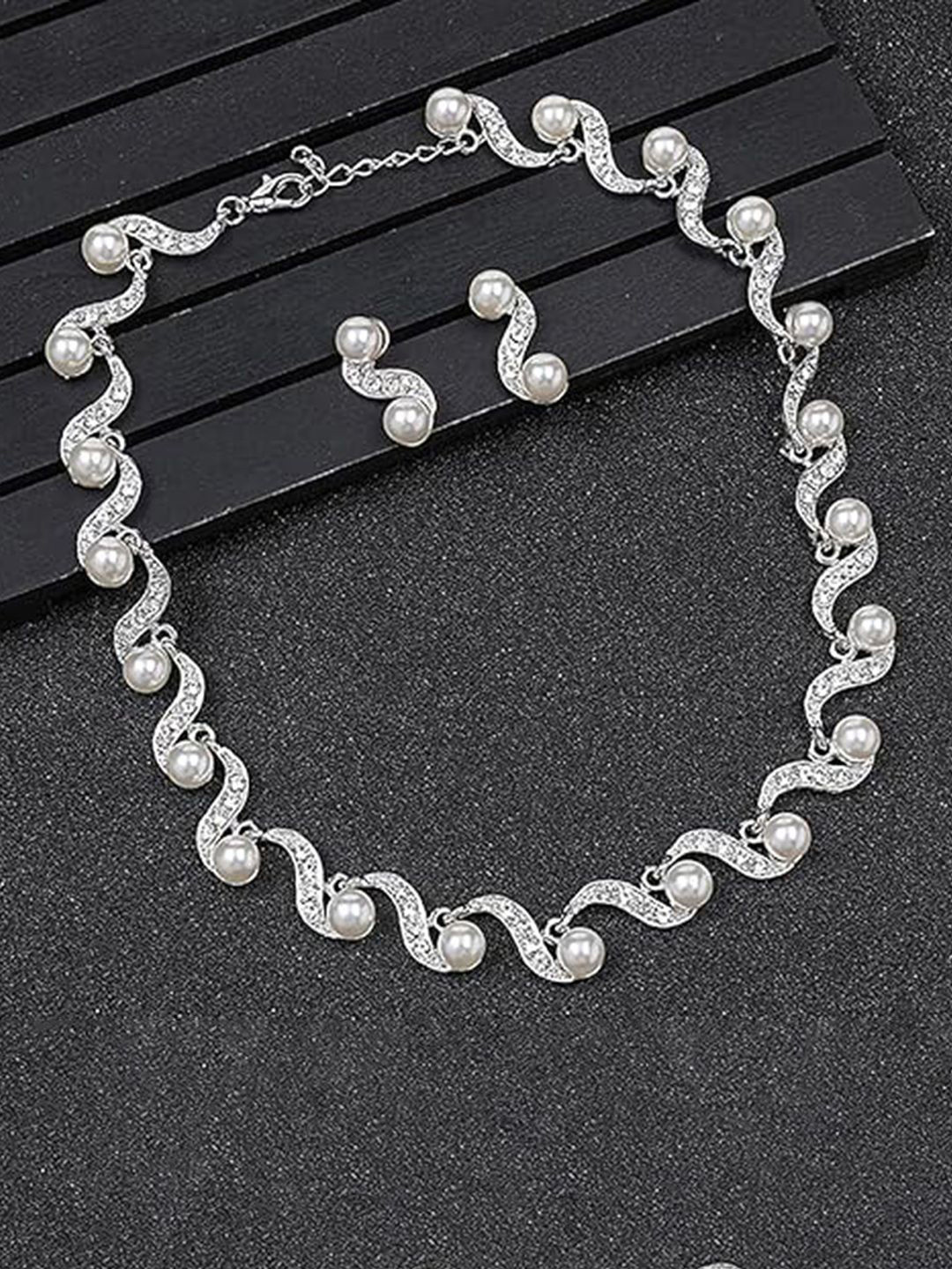Peora Silver Plated Crystal & Pearls Studdded Wave Shaped Necklace With Drop Earrings