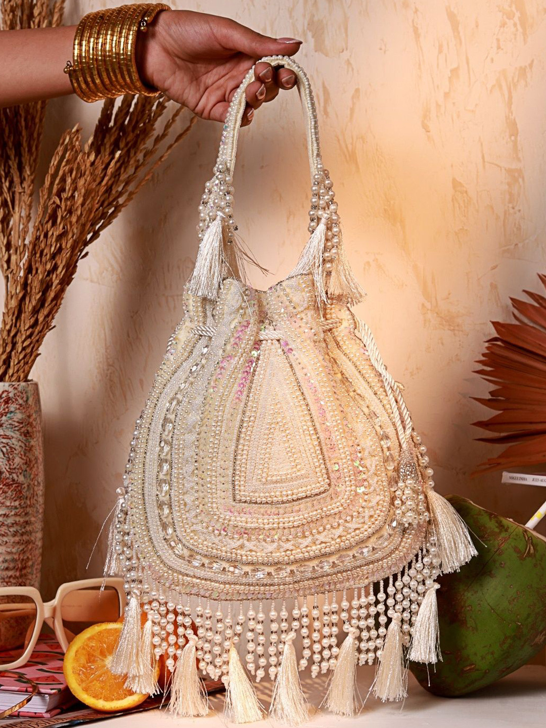 THE TAN CLAN Embroidered Nora Tasselled Potli Bag