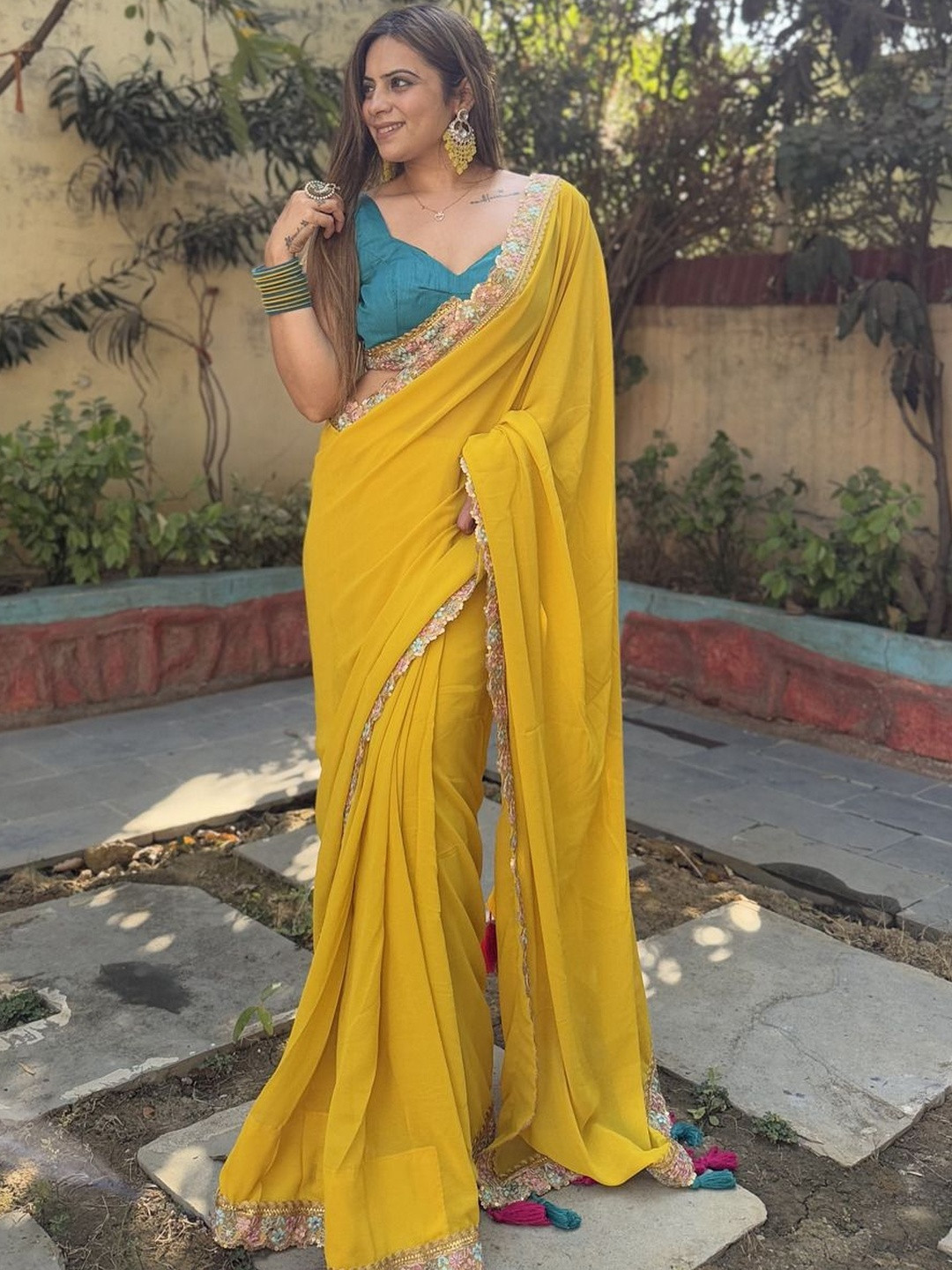 Peach Petals Solid with Beads and Stones border Pure Georgette Saree