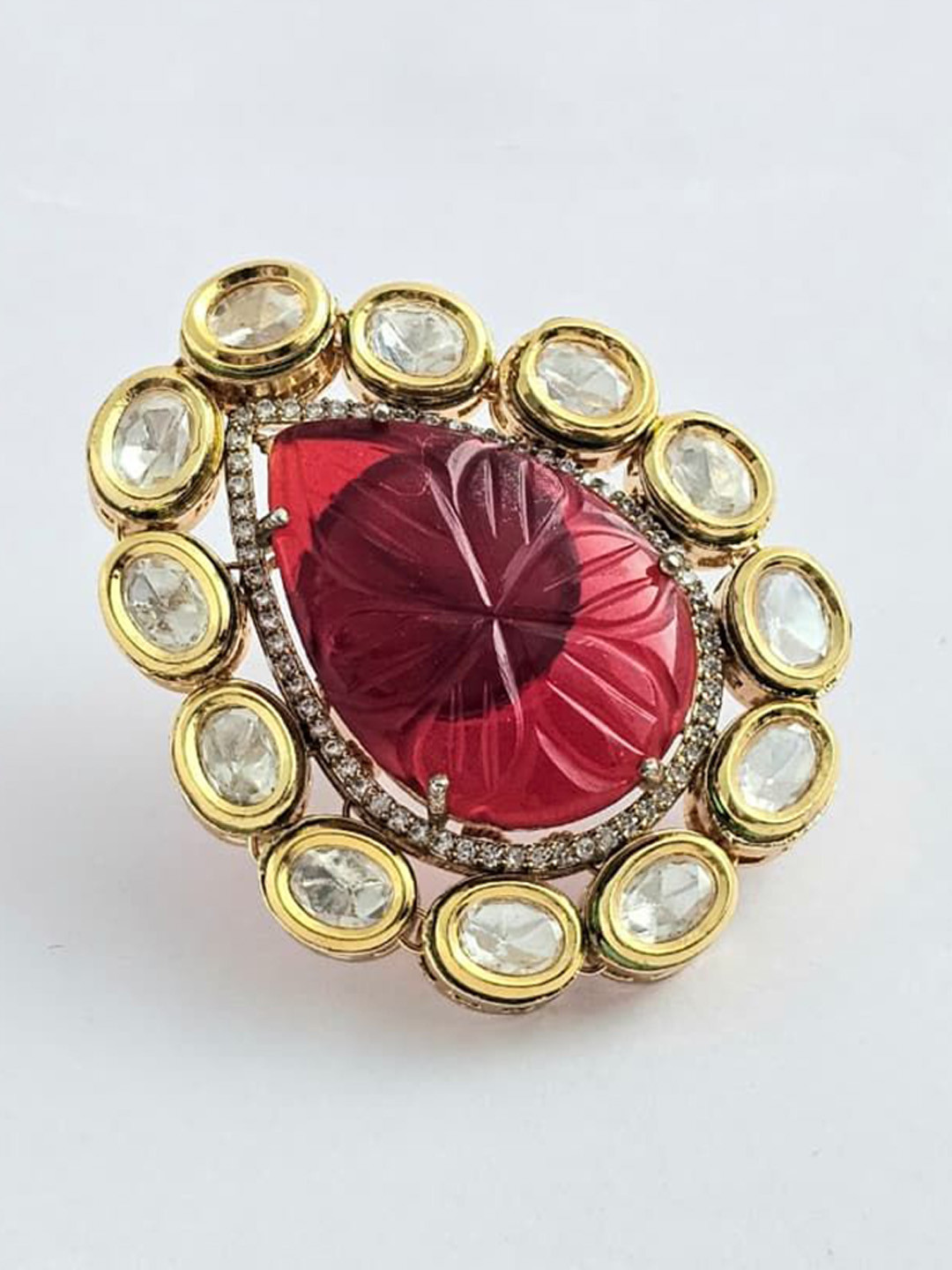Binnis Wardrobe Gold-Plated Kundan Studded Mystic Carved Adjustable Finger Ring