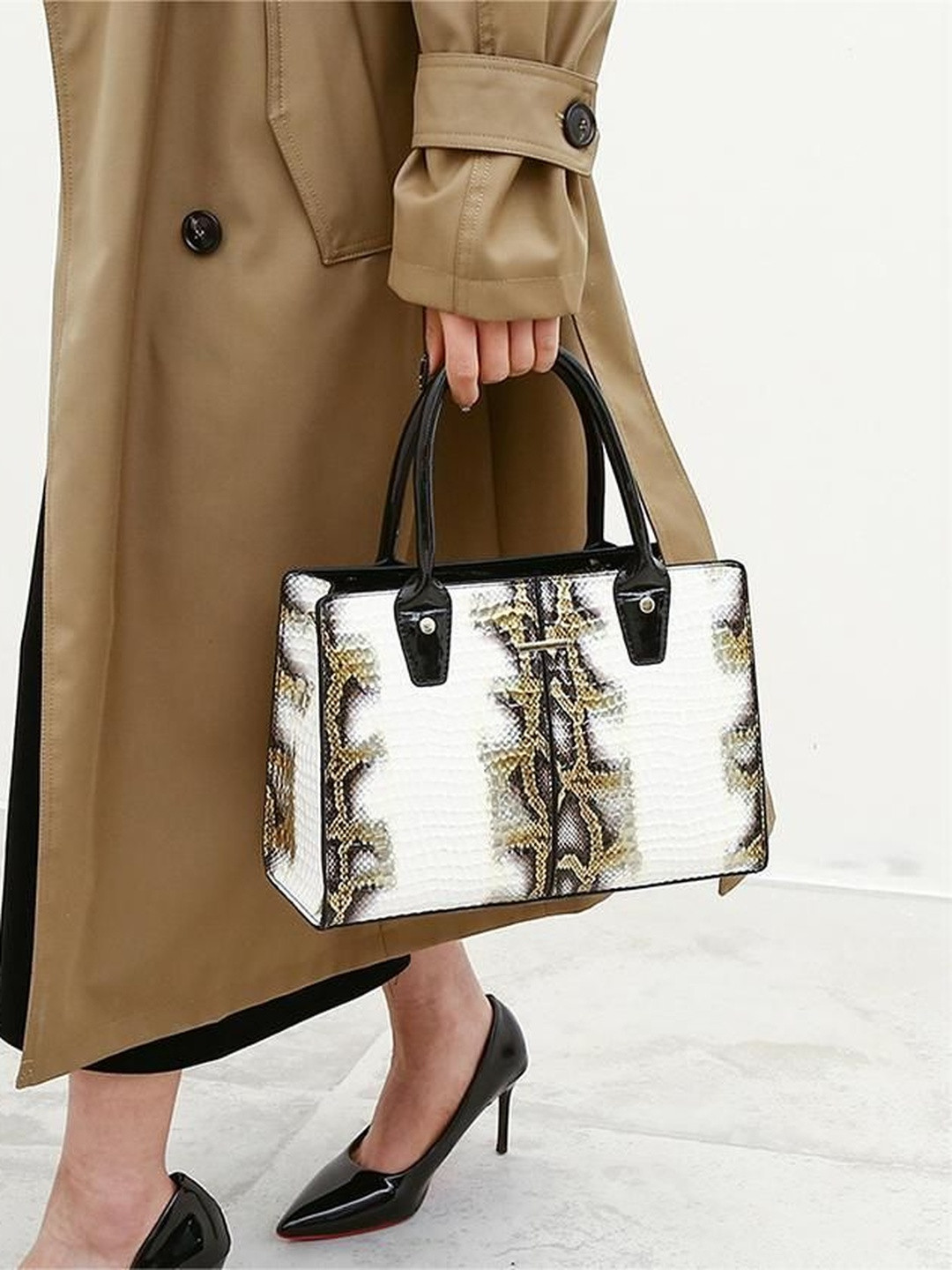 CORSICA Women Gold Handbags