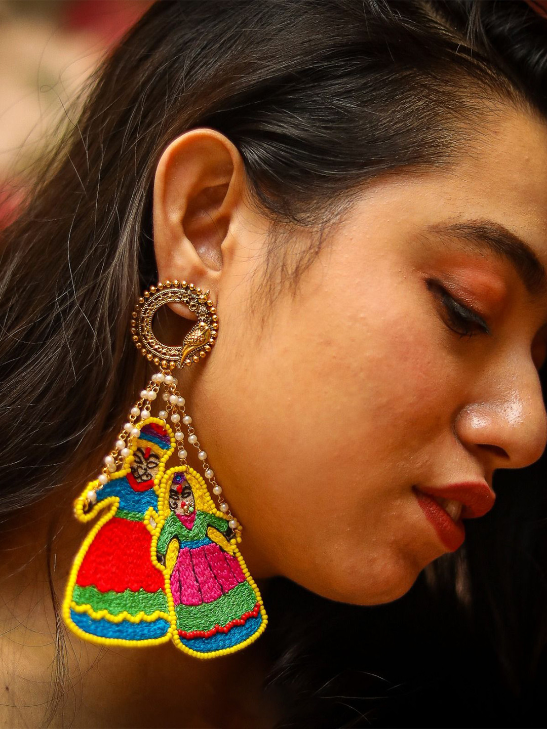 Abeo Artificial Beaded Kathputli Shaped Drop Earrings