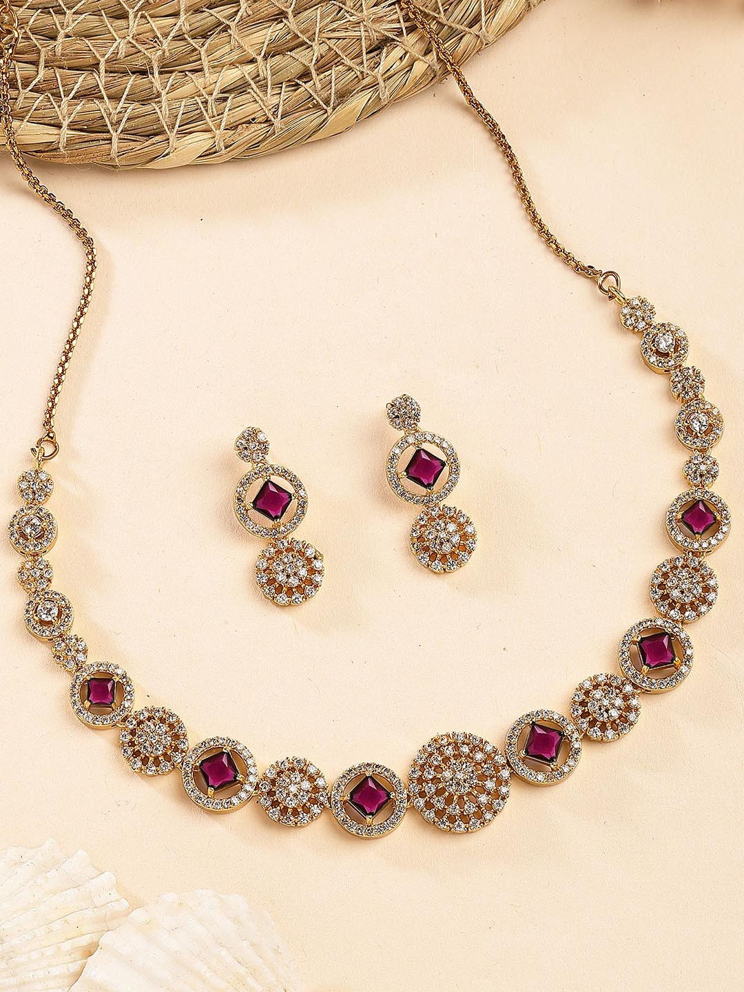 KARATCART Gold-Plated Red Stone Studded Round Chakra Design Jewellery Set