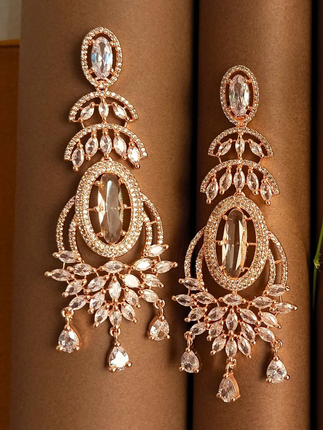 IKSAVA Rose Gold Plated American Diamond Studded Spherical Shaped Drop Earrings