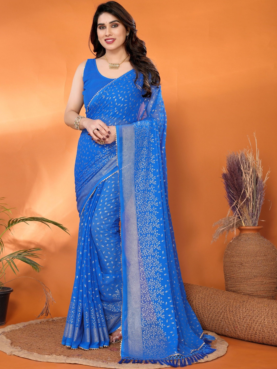 KALINI Blue Poly Georgette Woven Design Sarees