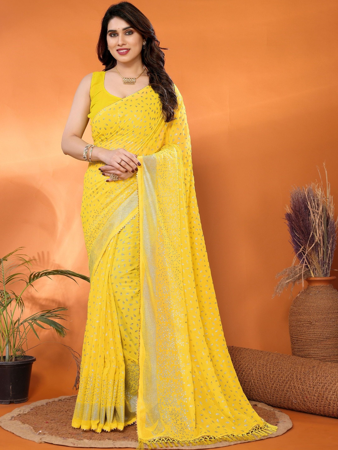 DIVASTRI Women Yellow Poly Georgette Saree With Foil Work & Tassel