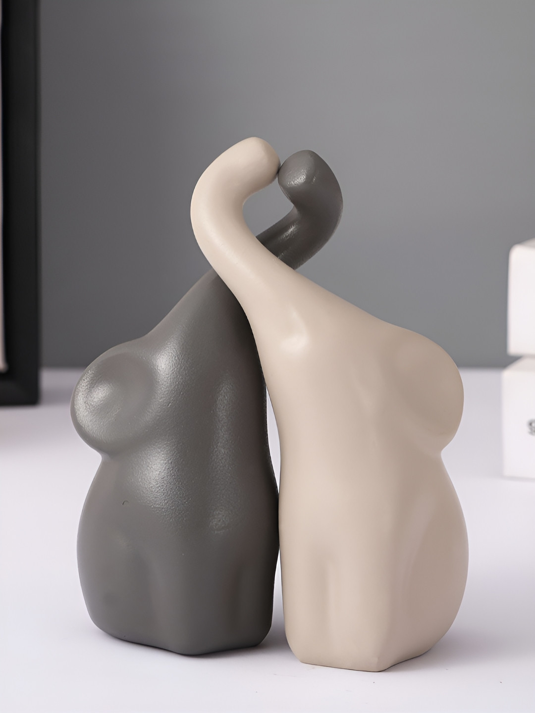 TIED RIBBONS Decorative Loving Elephant Pair Statue Showpiece