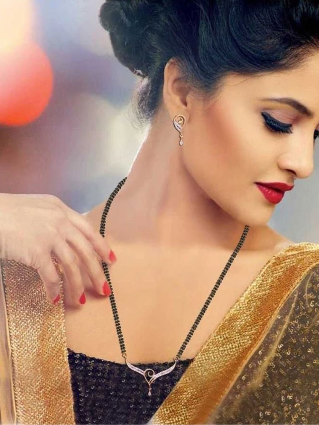 ADITYA COLLECTION Gold-Plated Stone Studded & Black Beaded Mangalsutra