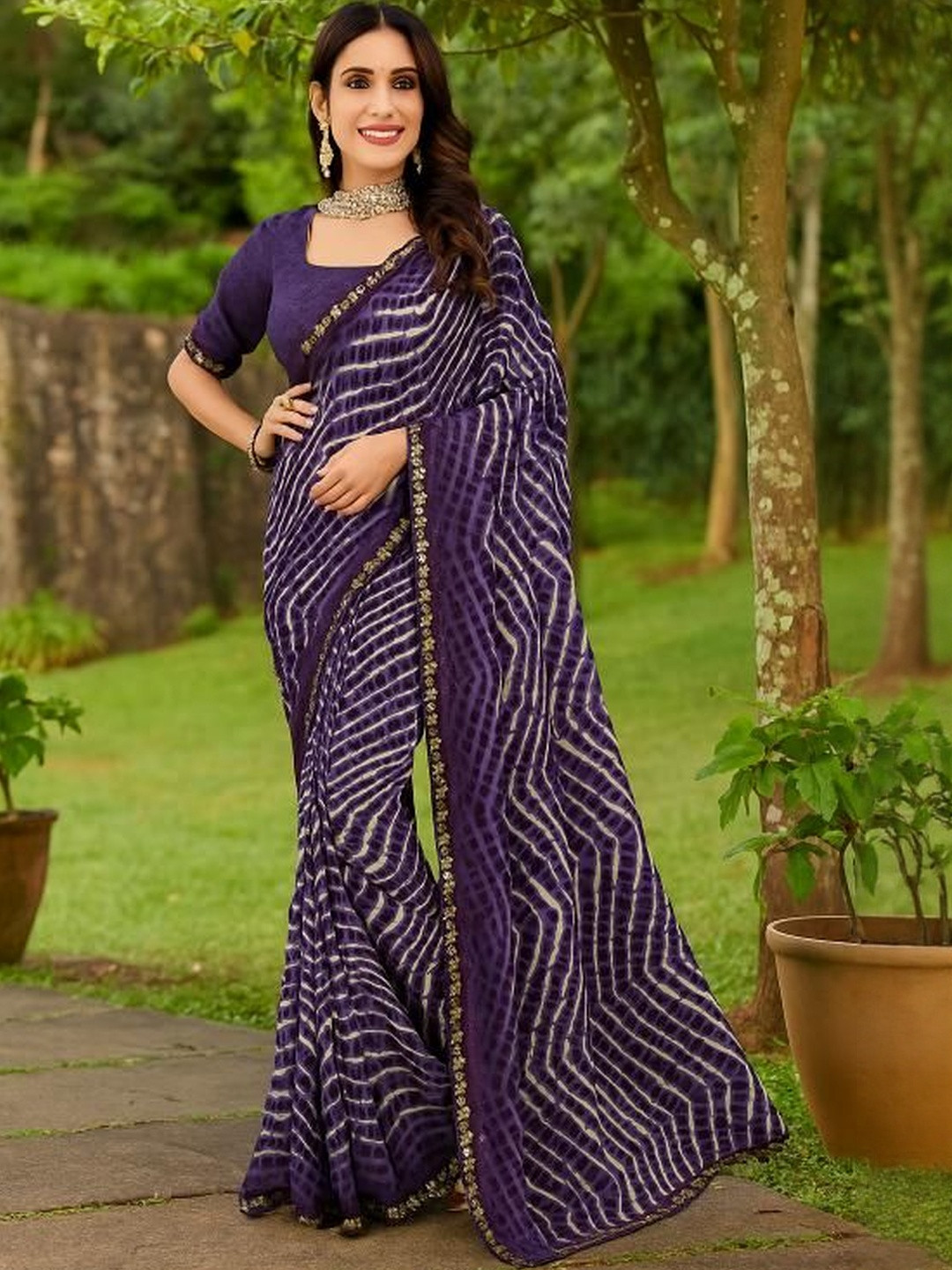 Moda Rapido Violet Pure Georgette Printed Sarees