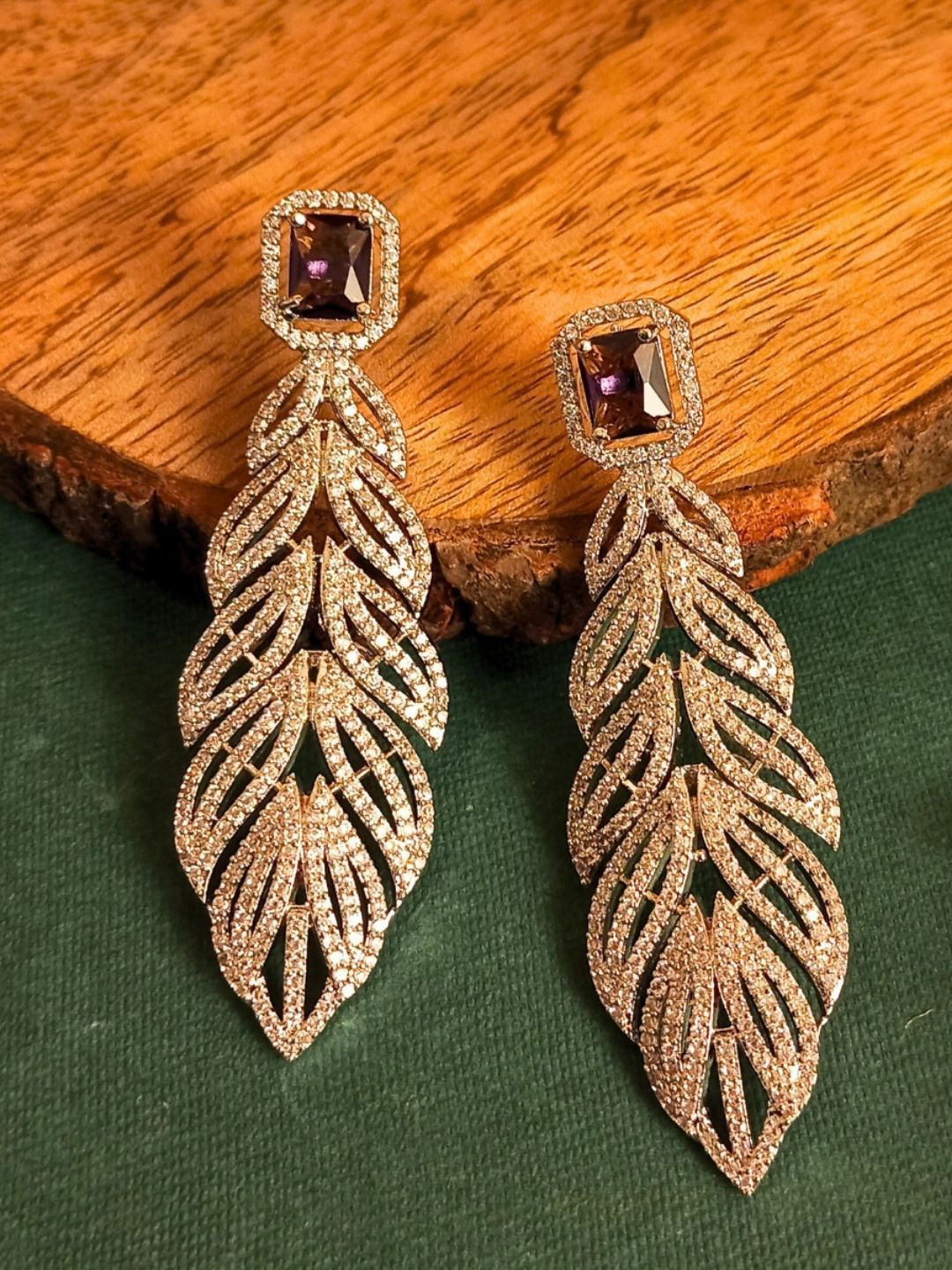IKSAVA Silver Plated American Diamond Studded Leaf Shaped Drop Earrings