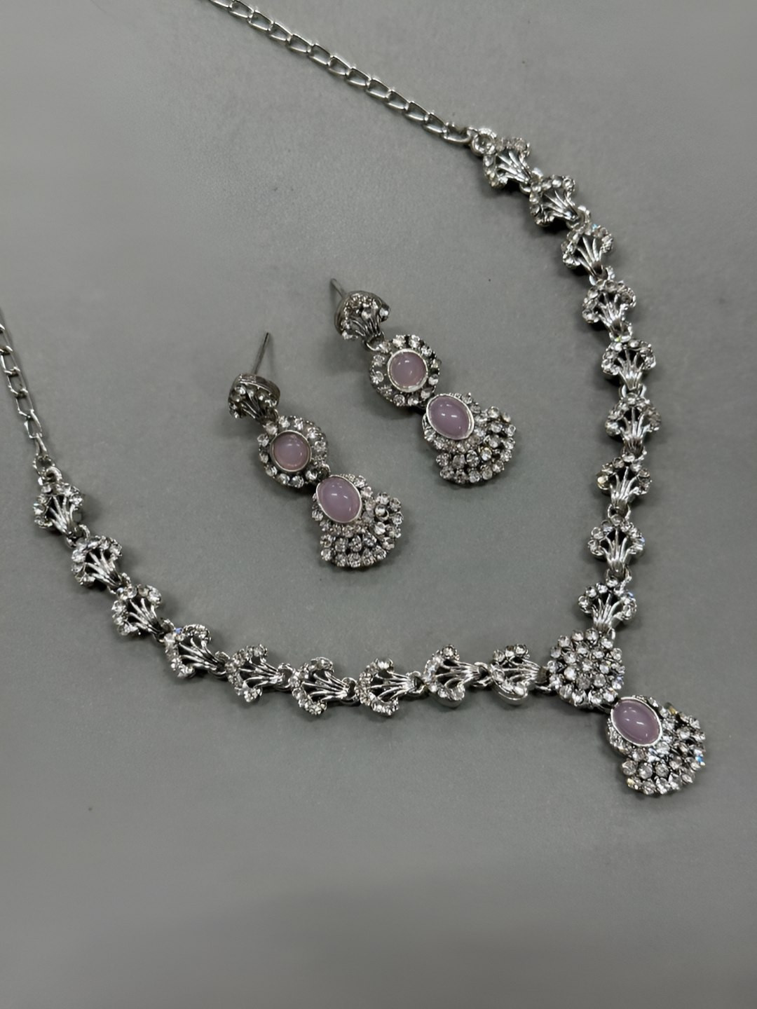 Women Click Rhodium Plated Artificial Stones Studded Necklace & Earrings