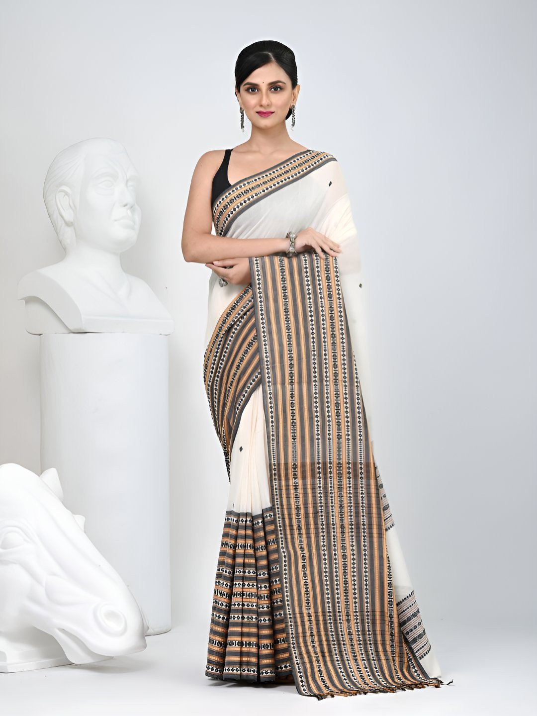 Charukriti Cotton Saree with Intricate Striped Border and Tassels