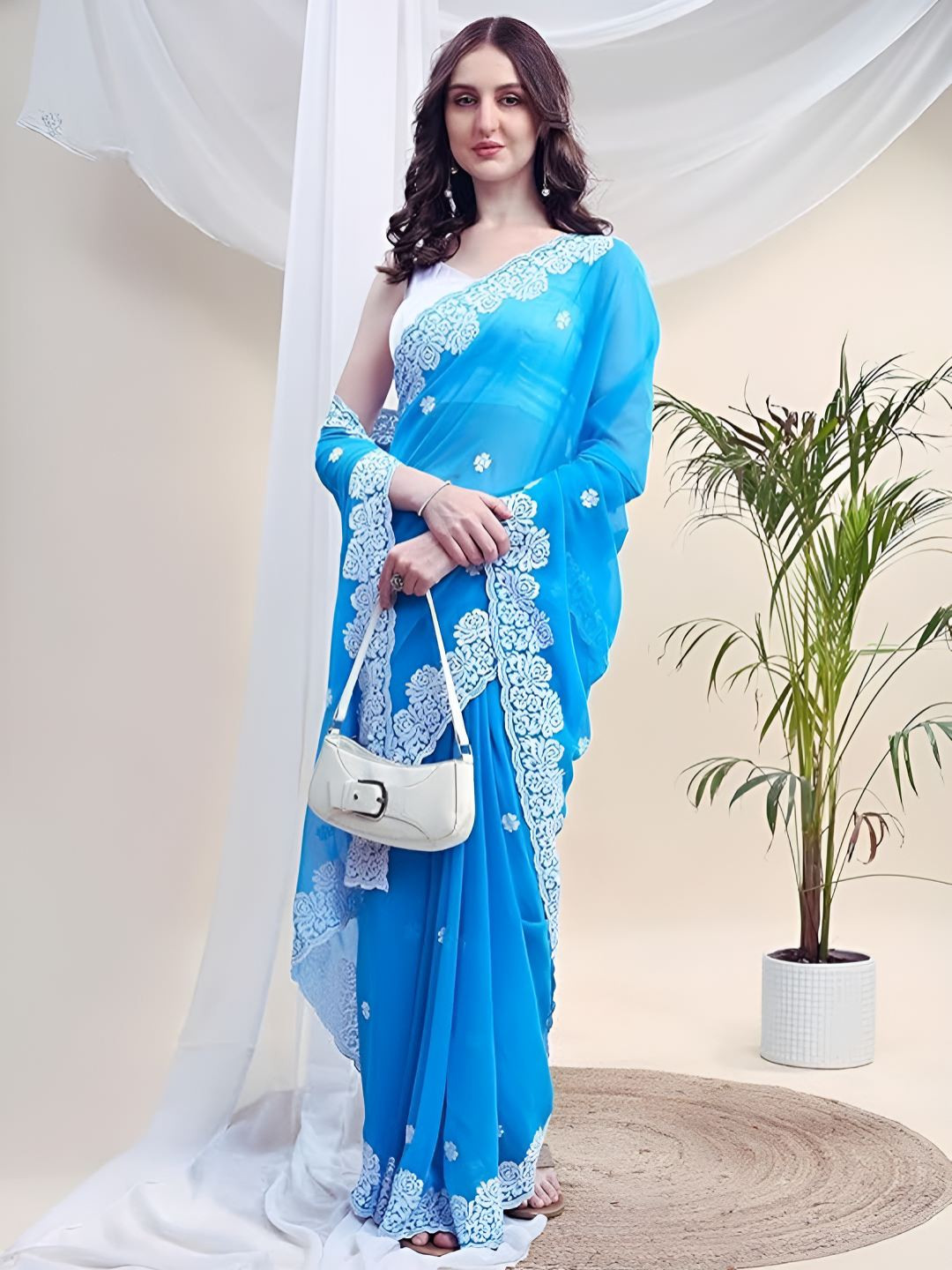 HESVI Ethnic Motifs Embroidered Net Saree