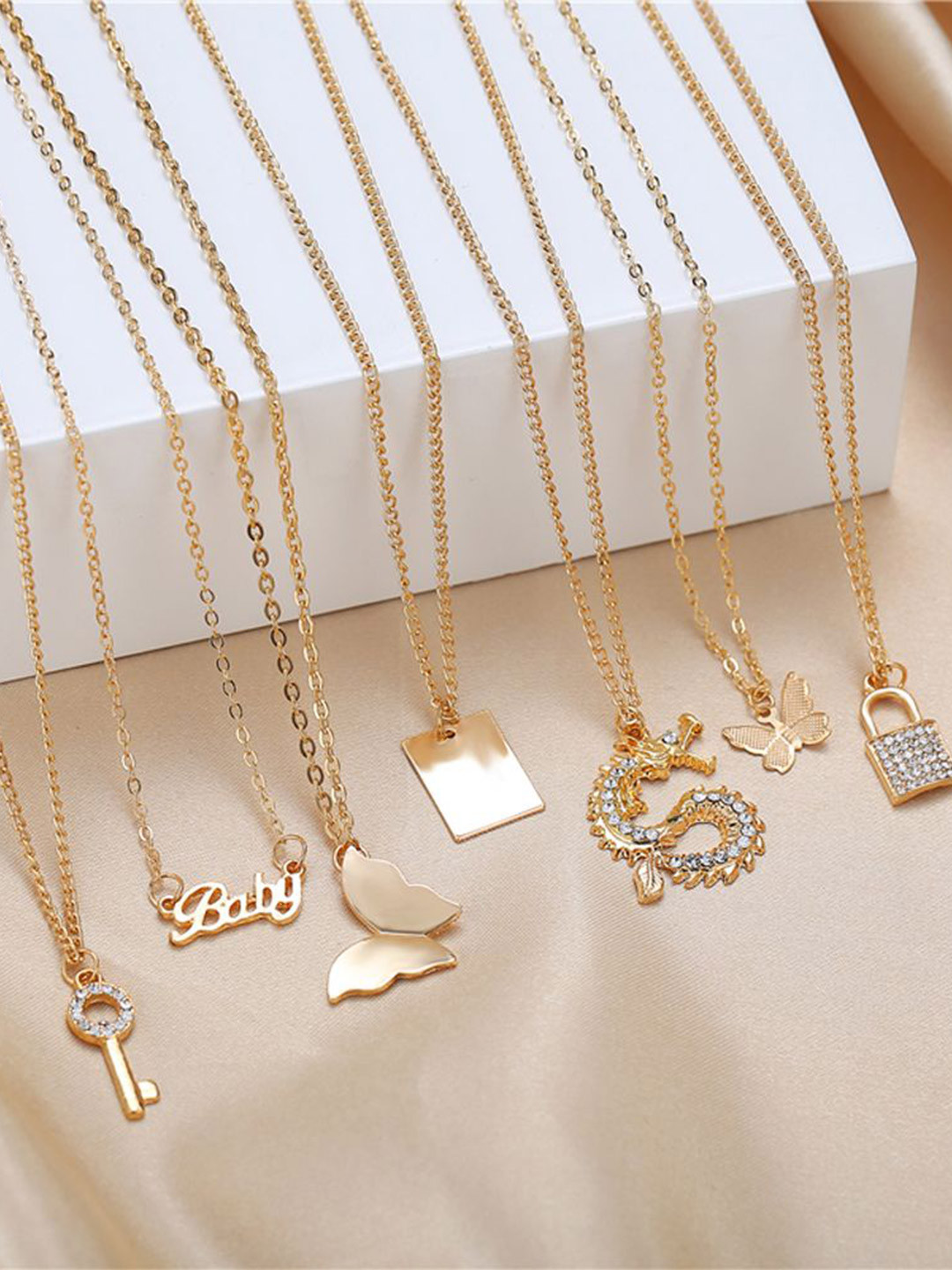 Shining Diva Fashion Set Of 7 Gold Plated Butterfly Stones Studded Necklace With Chains