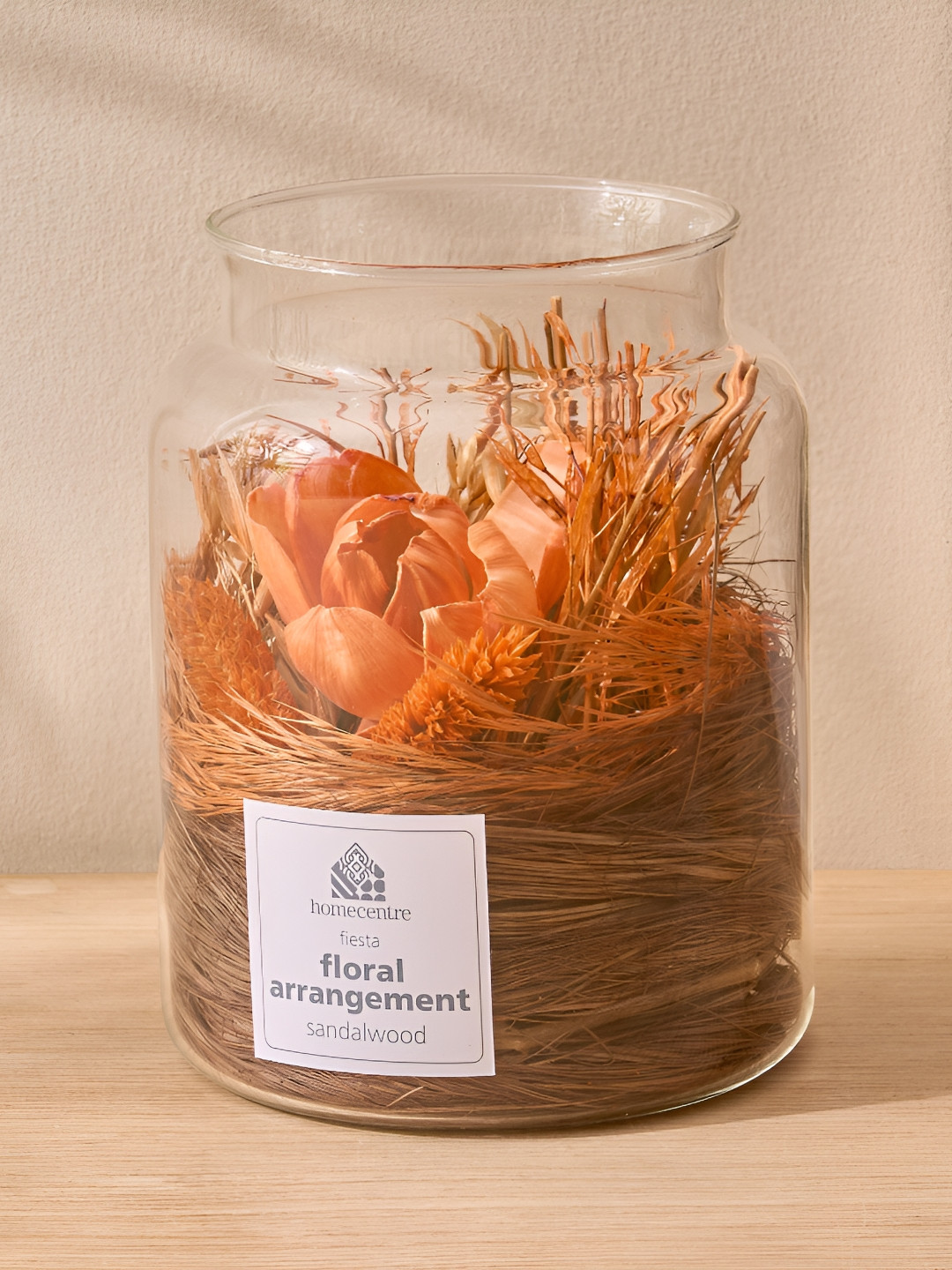 Home Centre Transparent & Orange Glass Sandalwood Potpourri Floral Arrangement In Jar