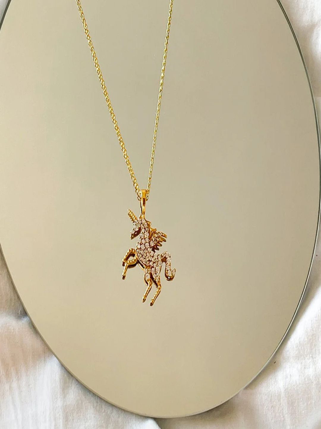 ALSO - A Look to Stand Out Gold-Plated Cubic Zirconia Studded Pendant With Chain