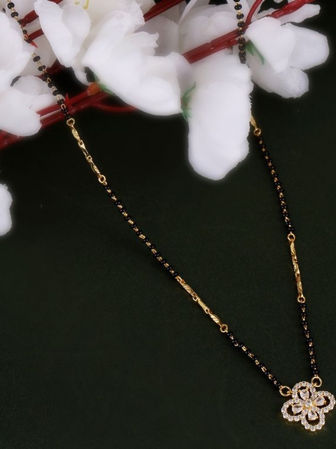 SALONI FASHION JEWELLERY Women Gold-Plated Artificial Stones Flower Design Mangalsutra