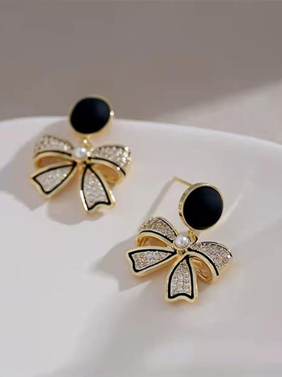 Aryee Korean Sterling Silver Artificial Stones Studded Bow Shaped Enamelled Drop Earrings
