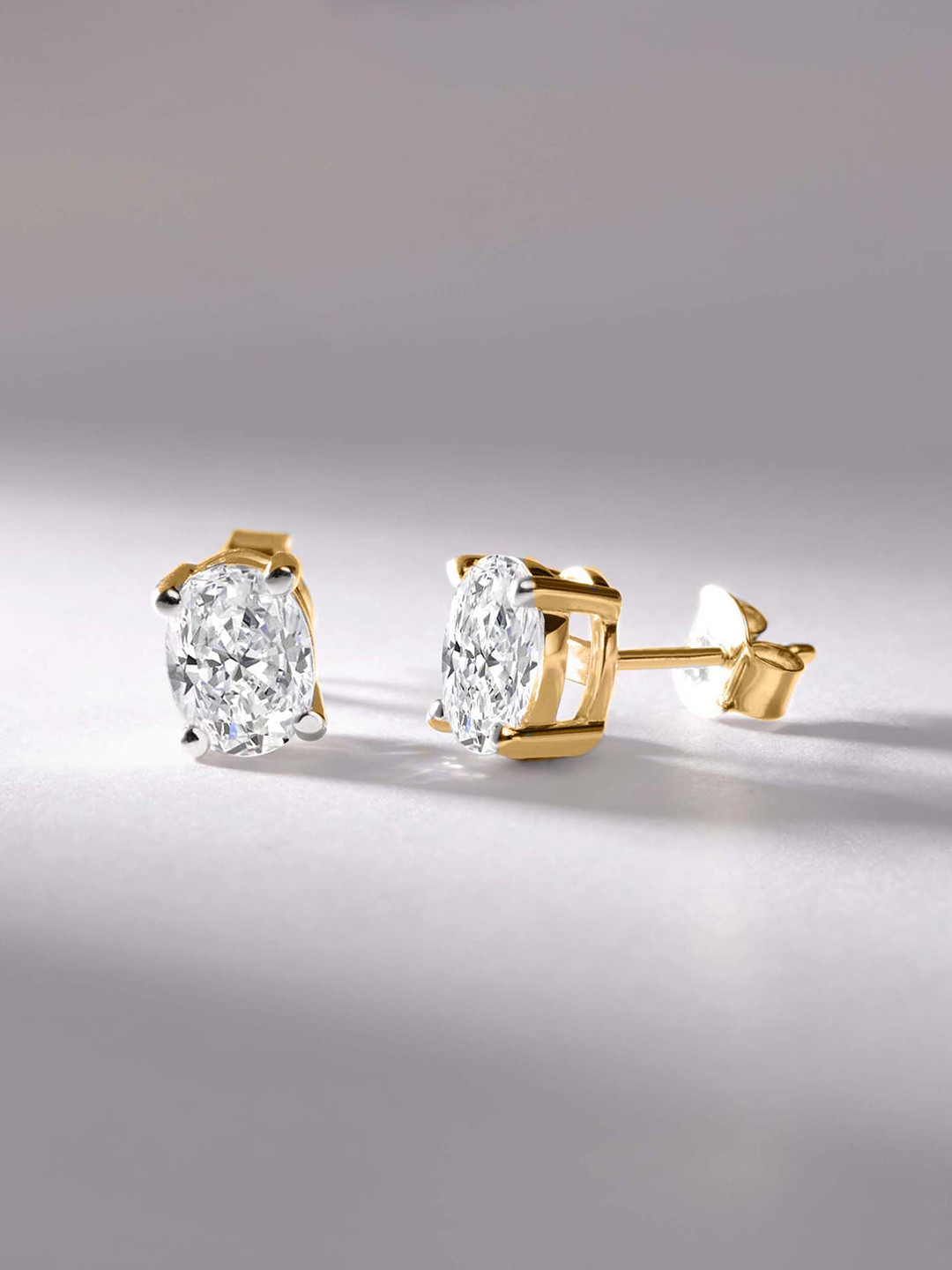 Sparkles 14Kt Gold Oval Solitaire Lab Grown Diamond Stud Earrings- 1.65 g