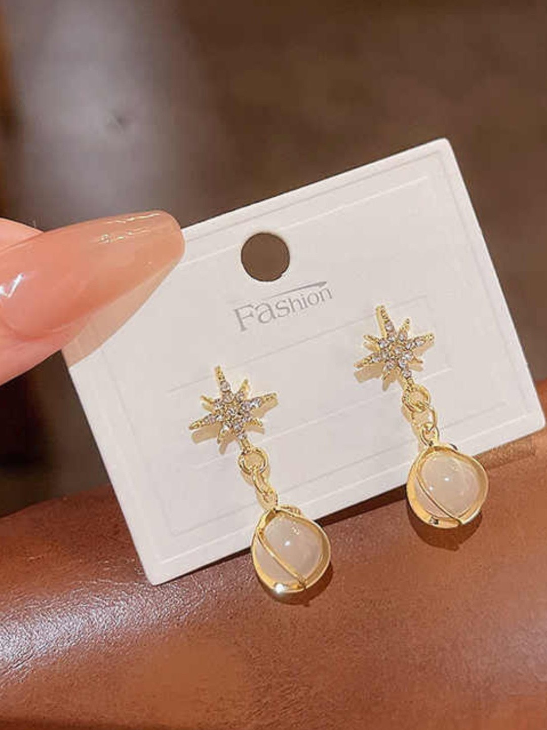 DressBerry Women Gold-Plated American Diamond Star Drop Earrings