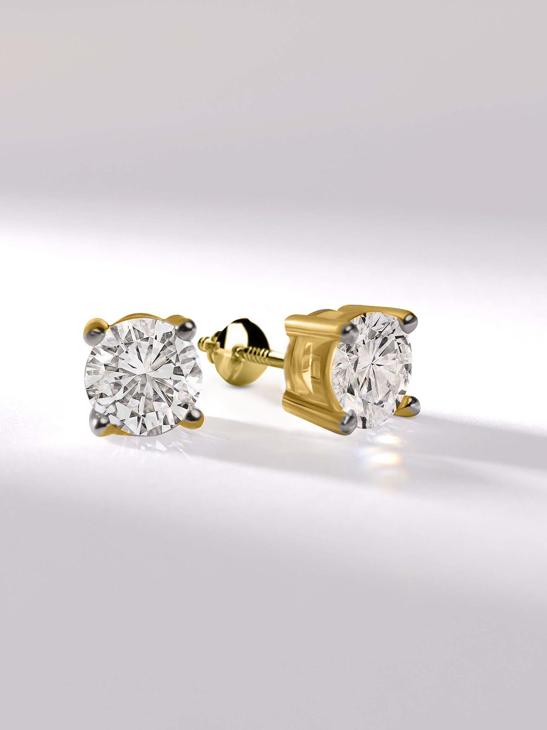Sparkles Women 14Kt Gold Stud Earrings With 0.25 Carat Lab Grown Diamond-1 g