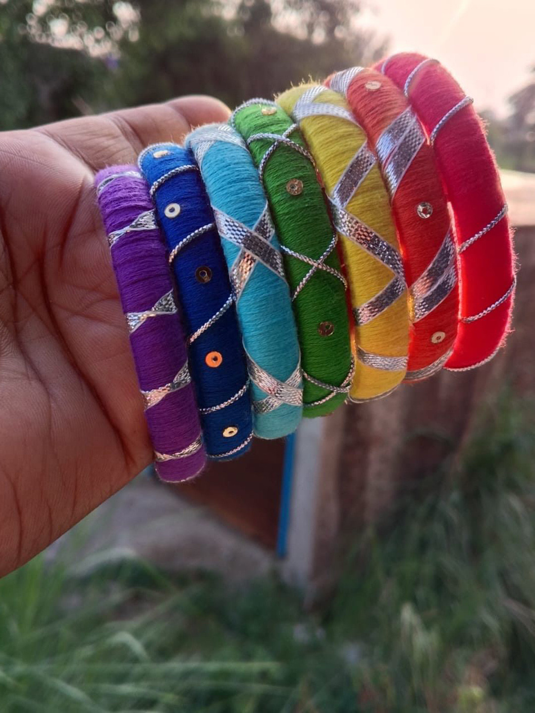 NUEVOSPORTA Set Of 7 Sterling Silver Thread Work And Sequence Design Bangles