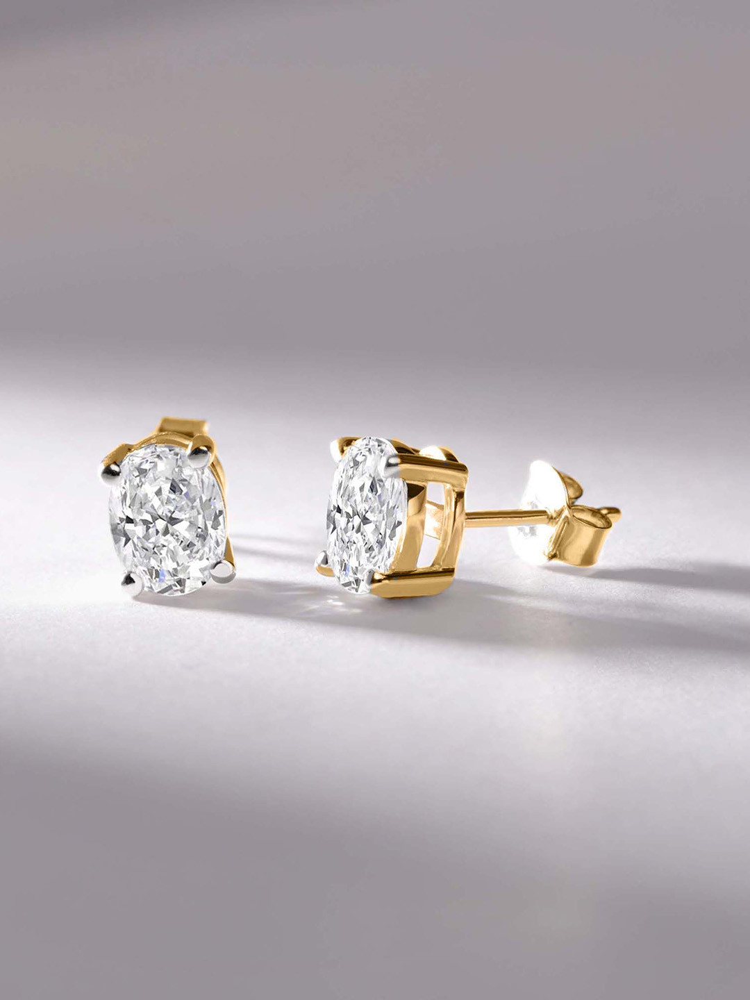 Sparkles 14Kt Gold Oval Solitaire Stud Earrings With 1.5 Carat Lab Grown Diamond- 1.65 g