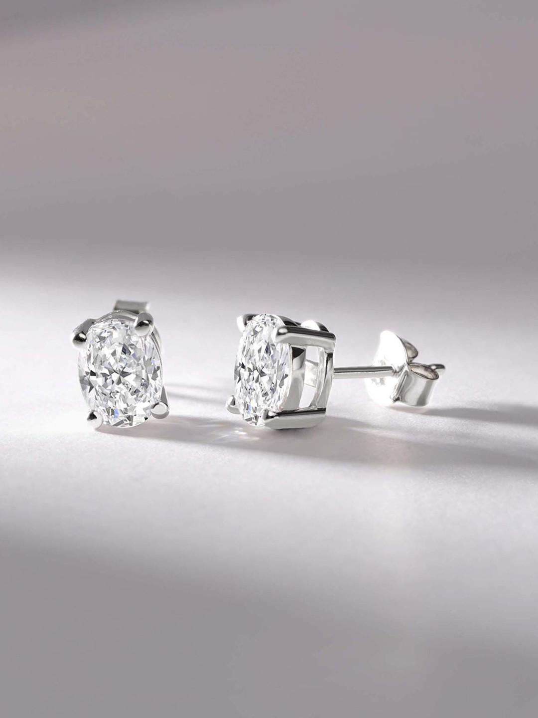 Sparkles 14Kt Gold Oval Solitaire Stud Earrings With 1 Carat Lab Grown Diamond- 1.65 g