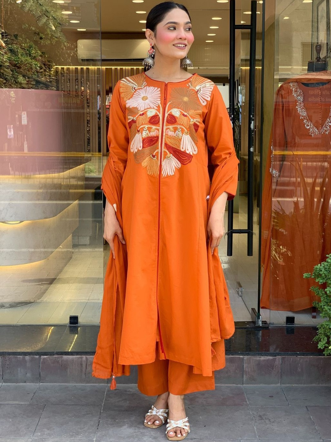 KALINI Women Orange Chanderi Silk Floral Embroidered Kurta Set With Trousers & Dupatta