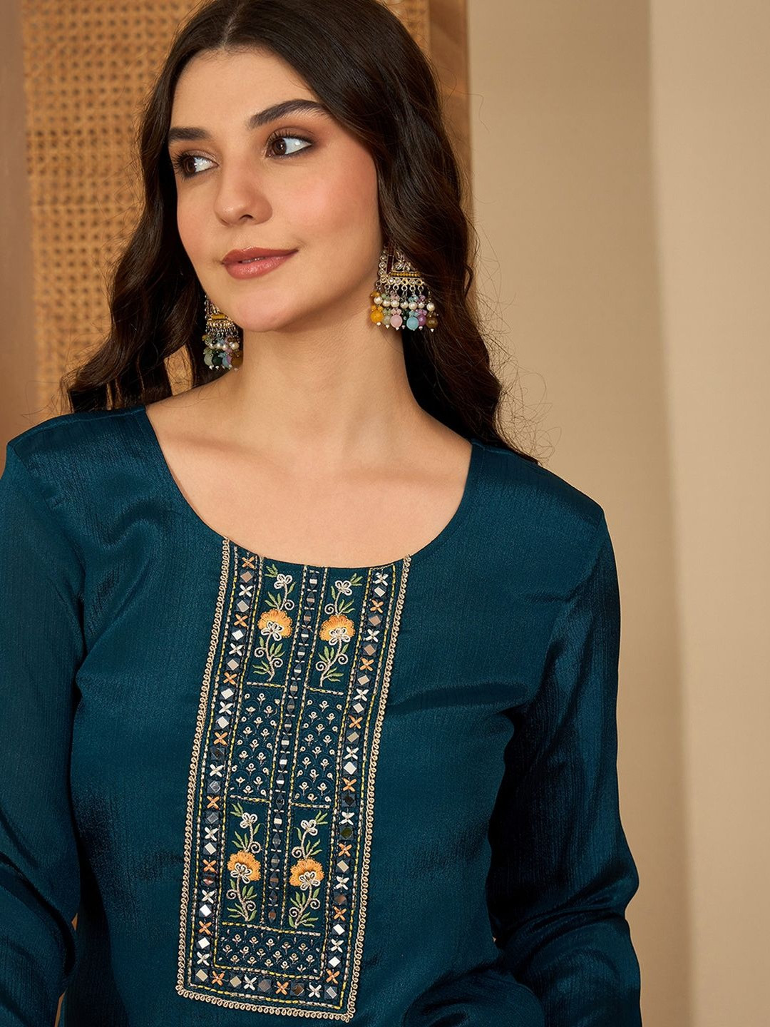 Sangria Women Ethnic Motifs Embroidered Asymmetric Sequinned Kurti with Palazzos