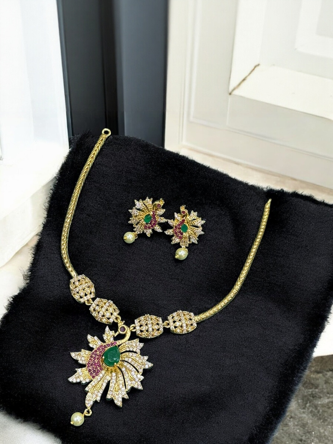 Freydis Gold Plated American Diamond Studded Necklace And Earrings