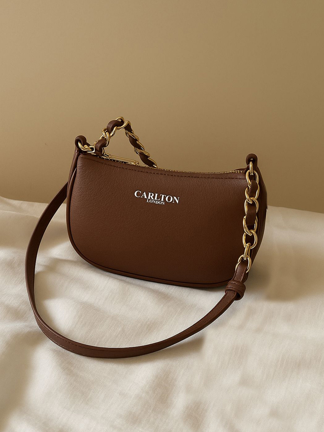 Carlton London Women Solid Half Moon Tasselled Handheld Bag