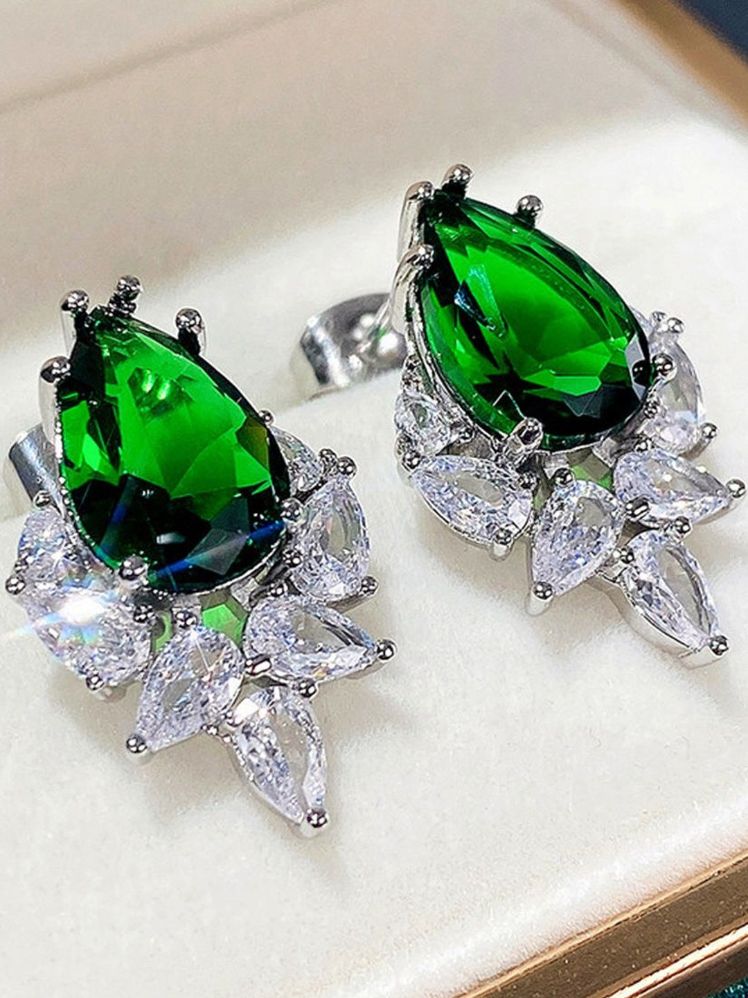 Jewels Galaxy  Silver Plated American Diamond Studded Crushed Tear Drop Earrings