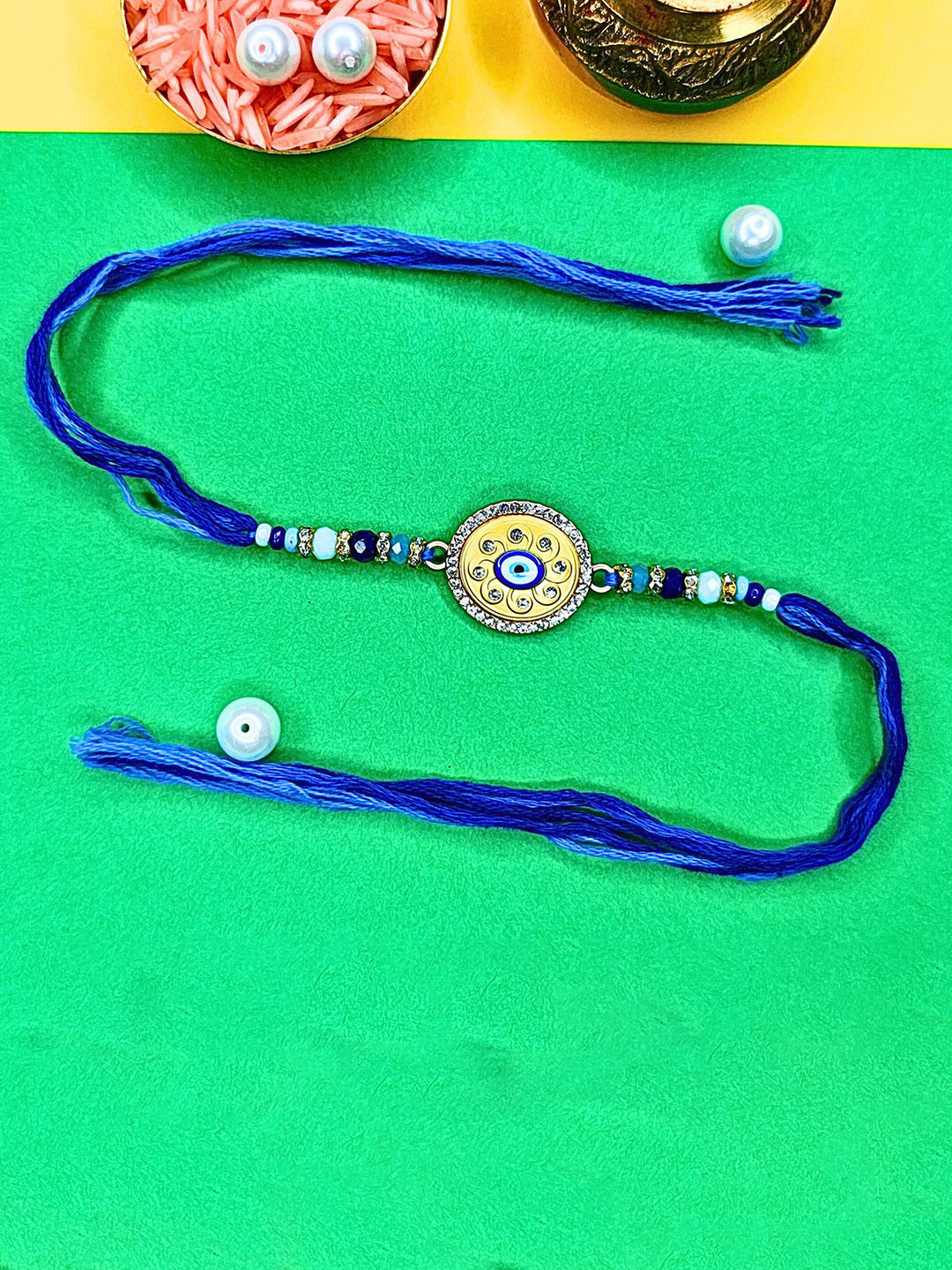 ORANGENYSHA American Diamonds Studded & Beaded Meenakari Evil Eye Rakhi