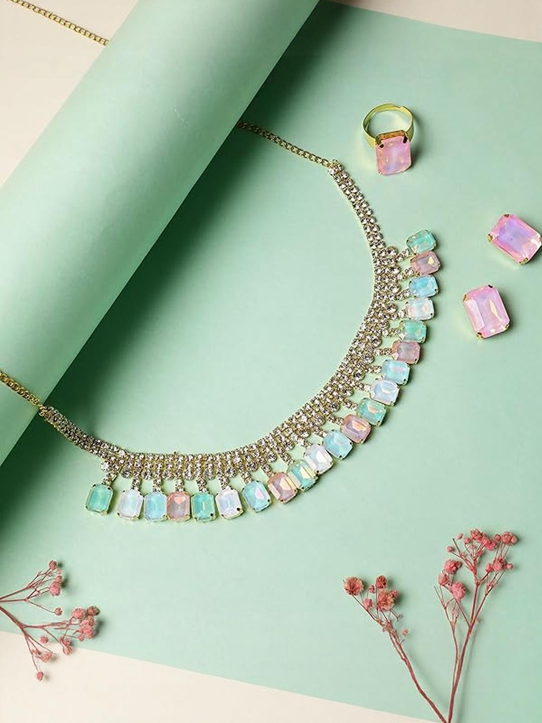 Anouk 18 K Gold Plated Light Crystal AD Gemstone Studded Jewelry Set With Ring