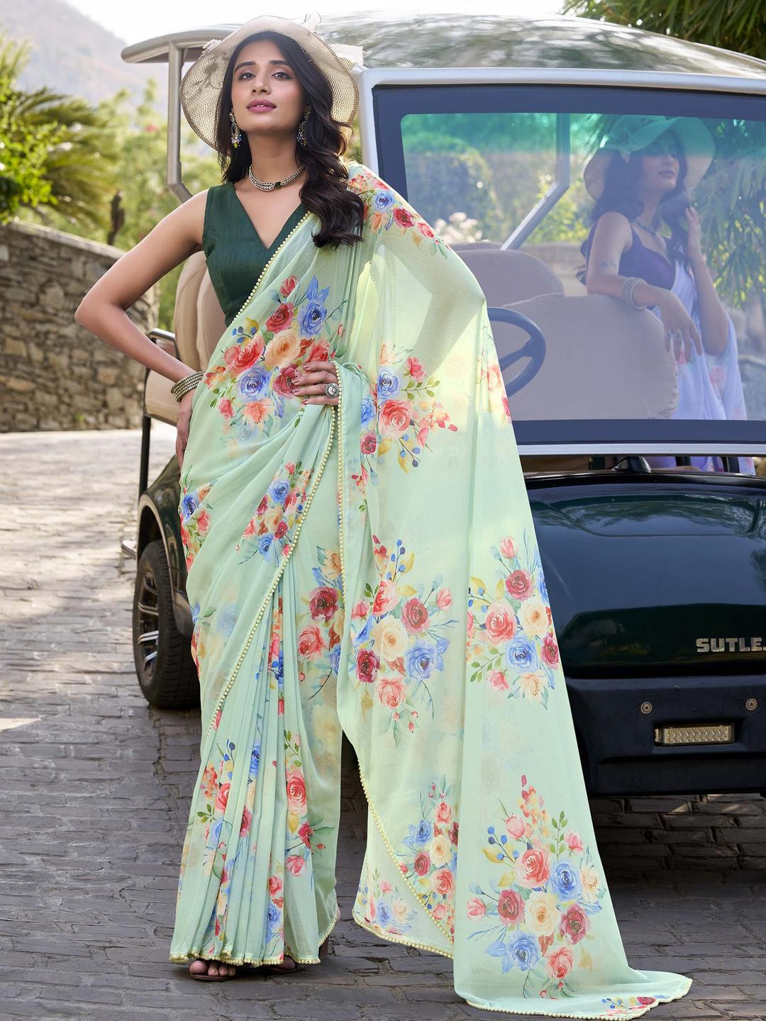LOOKNBOOK ART Floral Printed Pista Pure Georgette Saree for women