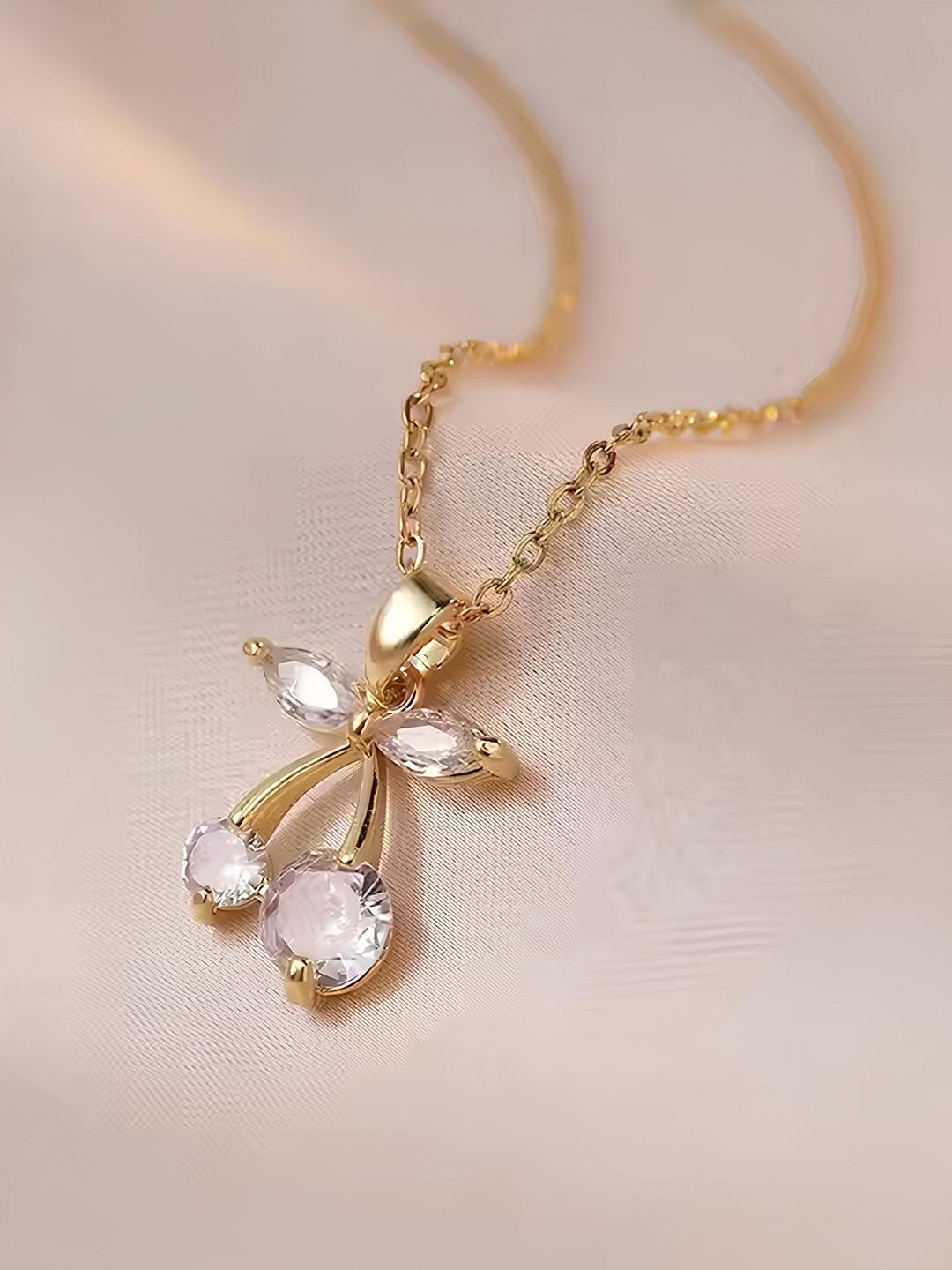 Bohey by KARATCART Gold-Plated American Diamond Studded Cherry Shaped Pendant With Chain